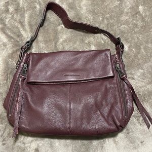 Beautiful leather purse between a burgundy  & purplish  Aimeekestenberg